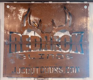 Redneck logo cut out in metal